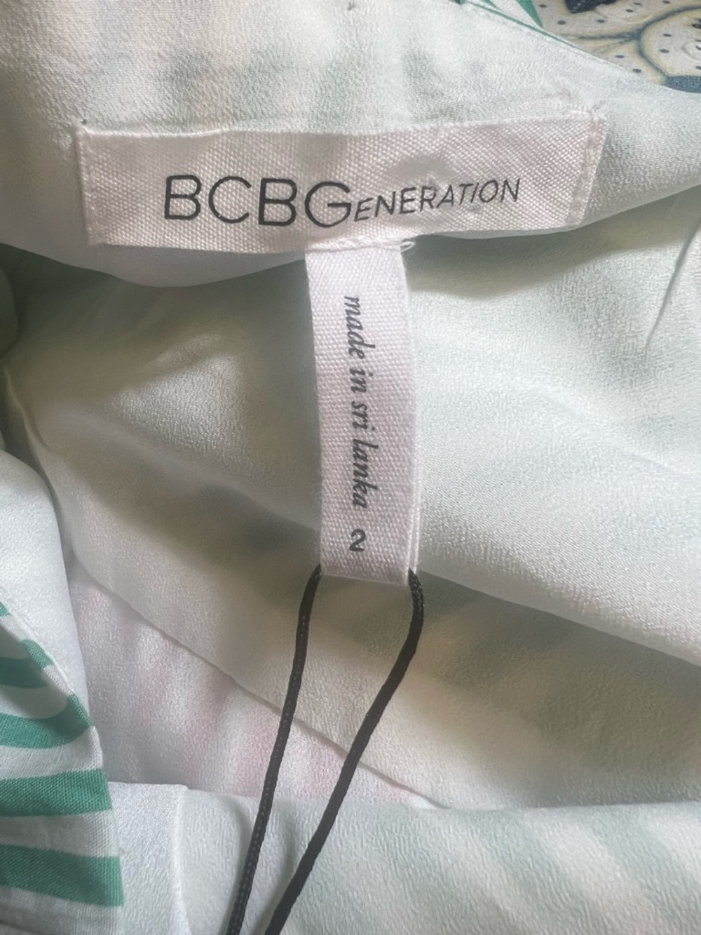 BCBGeneration Sleeveless Striped
Jumpsuit Pink and Green - Picture 6 of 7